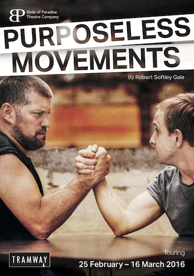 A promotional poster for 'Purposeless Movements'. It shows two men arm wrestling. 