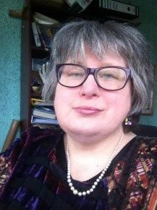 A photo of Jane Wallman-Girdlestone. She has short dark grey hair with a fringe and glasses.